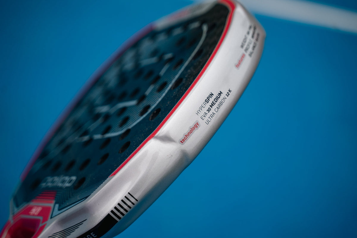 Close-up of a Pallap padel racket frame on a blue court